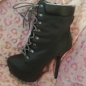 Black platform heeled Boots